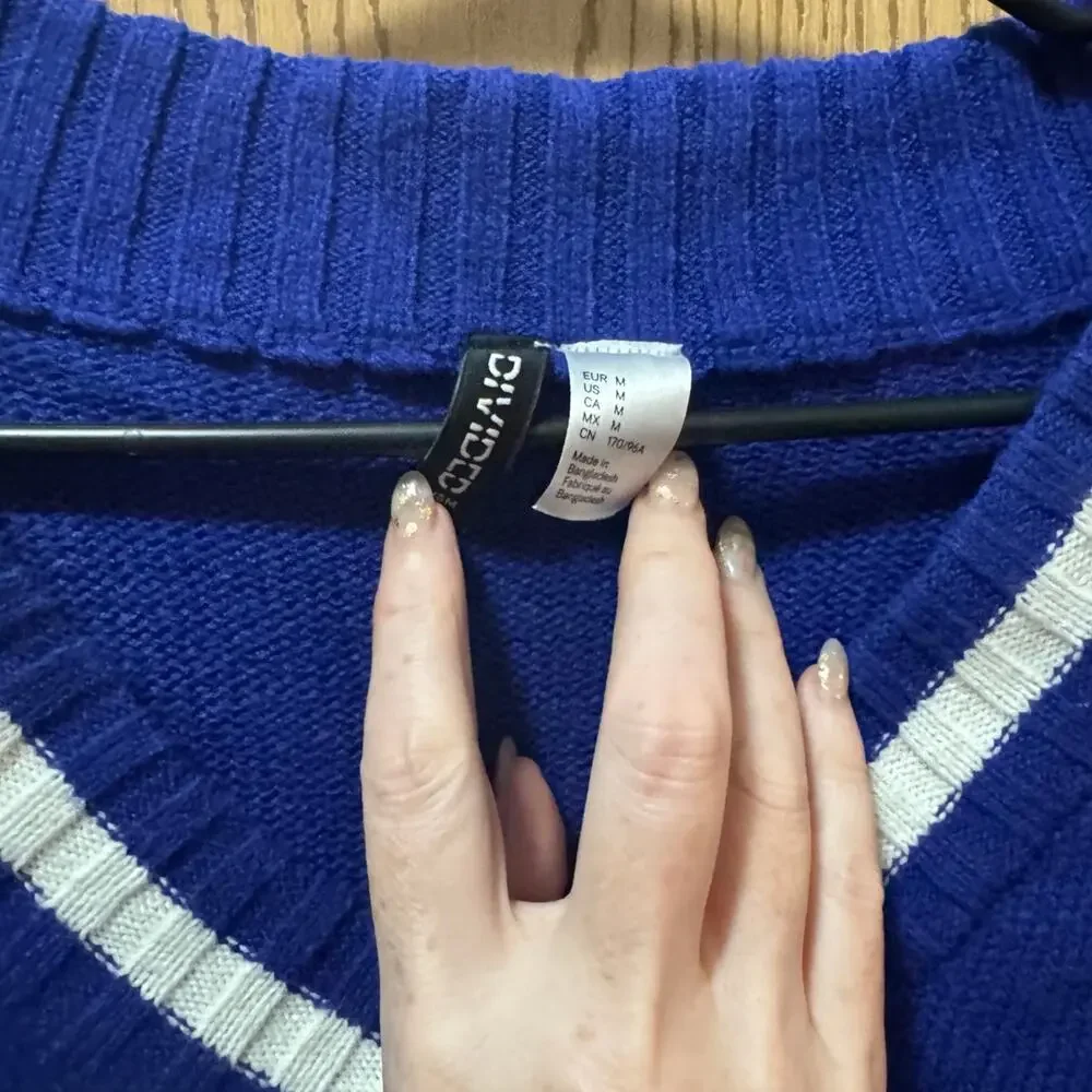 Divided Sweater size M